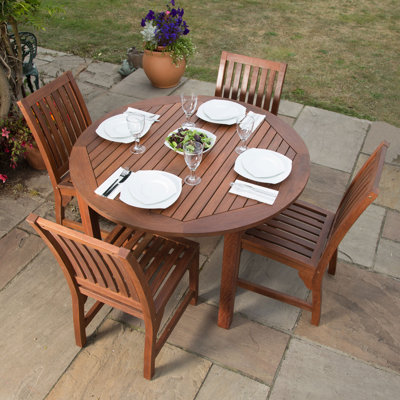 Devon 4 - Person Wood Patio Dining Set with Round Table