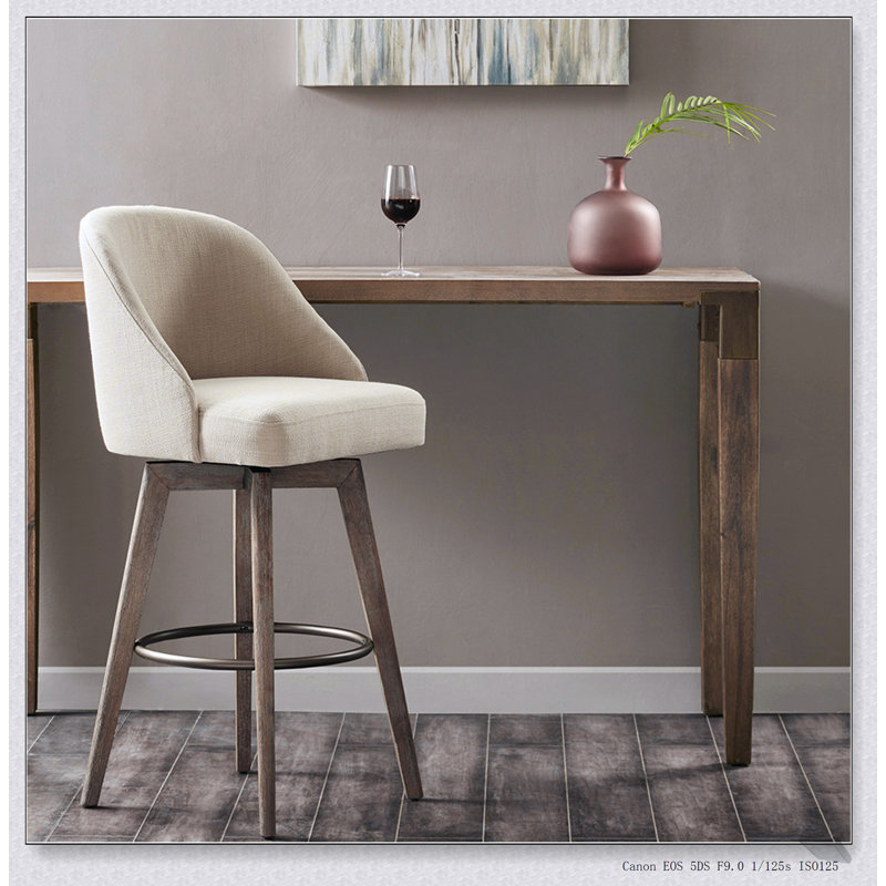 Tabouret de bar pivotant confortable avec un design ergonomique et des pieds en bois massif durables pour les cuisines et les bars modernes