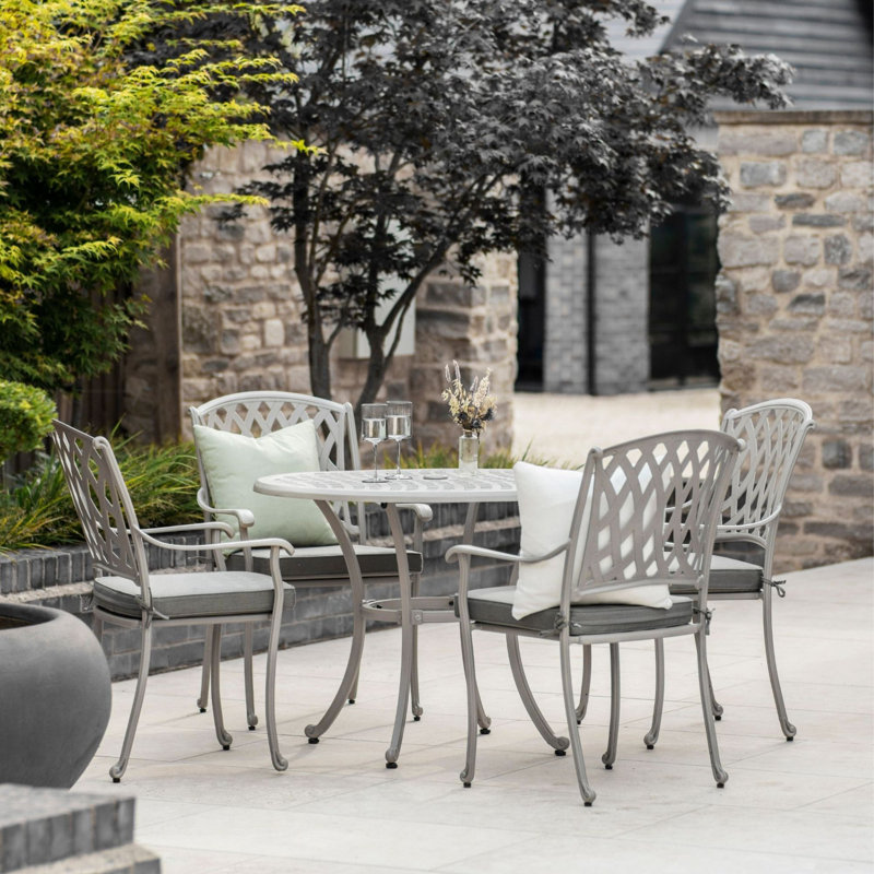 4 - Person Patio Dining Set with Round Table , Cushions Included