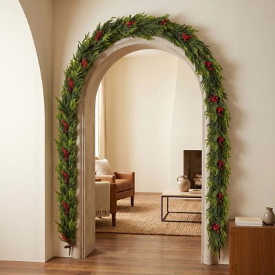 Christmas Garland with Pinecones and Red Berries