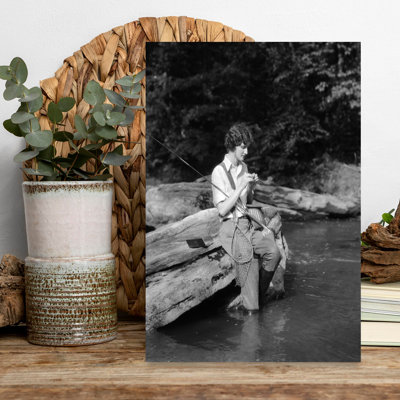 1920S 1930S Woman Sitting On Rock By Side Of Stream Wearing Waders Putting Fly On Tippet Classic Retro Vintage Fish Fly Portrait Wall Art