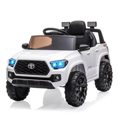 Tacoma pour enfants 12 V avec chauffeur, véhicule électrique avec télécommande, 2 vitesses, suspension, ceinture de sécurité et phares