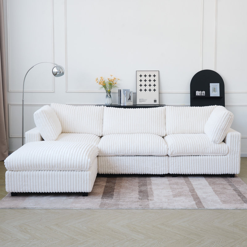 Canapé modulaire à accoudoirs larges avec repose-pieds 4 pièces Doris, Fausse fourrure beige