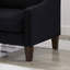 Fauteuil rembourré élégant avec pieds en bois et housse en velours