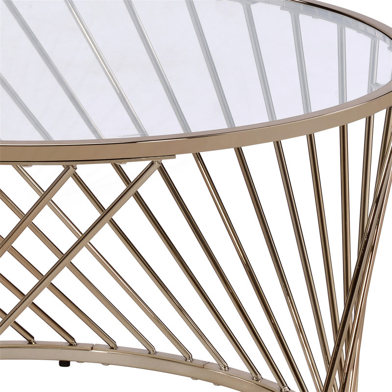 Table basse avec plateau en verre transparent et base en métal au fini champagne