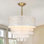 Lustre cylindrique en laiton 5 lumières avec accents de coquillage à plusieurs niveaux