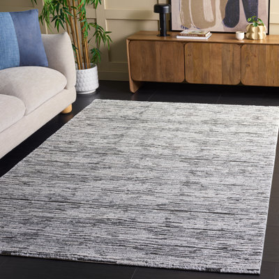 Tapis performance sans motif Lunara 302