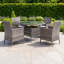 Nohemi 4 - Person Wicker Patio Dining Set with Round Table , Cushions Included-458871222