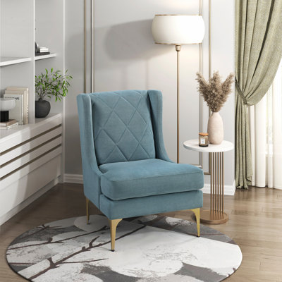 Luxueux fauteuil d'appoint à oreilles avec un confort exceptionnel et un design élégant, parfait pour les intérieurs modernes et classiques.
