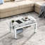 Table basse moderne en verre trempé avec pieds en miroir et tablette pour espaces de vie