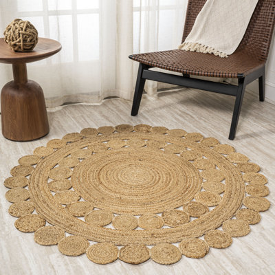 Tapis rond à motif géométrique brun
