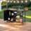 Chariot de barbecue extérieur avec évier, îlot de cuisine extérieur avec armoire de rangement, station de barbecue avec table d'appoint pliable et roues, table de barbecue d'extérieur pour le jardin, patio