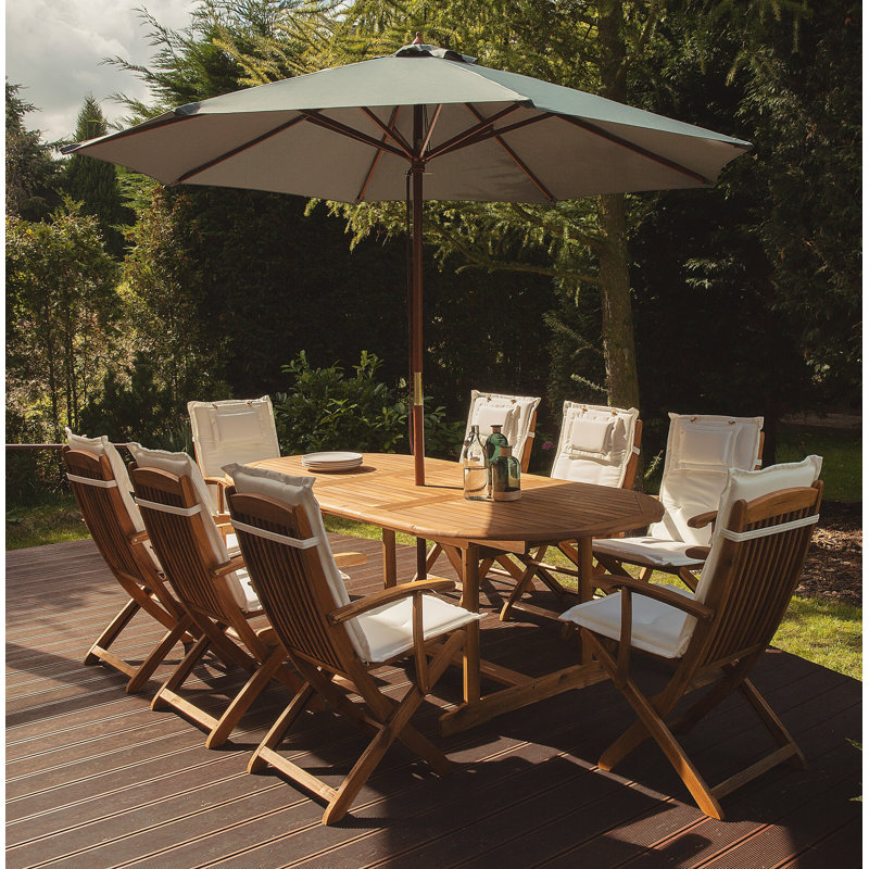 Creel 8 - Person Acacia Wood Patio Dining Set with Extendable Oval Table , Cushions Included, Beige/Green