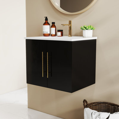 Meuble-lavabo mural de 24 po avec lavabo, charnières à fermeture en douceur, cuve en céramique, poignées dorées et grand espace de rangement noir brillant