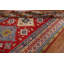 Tapis rouge à motif oriental Kazak