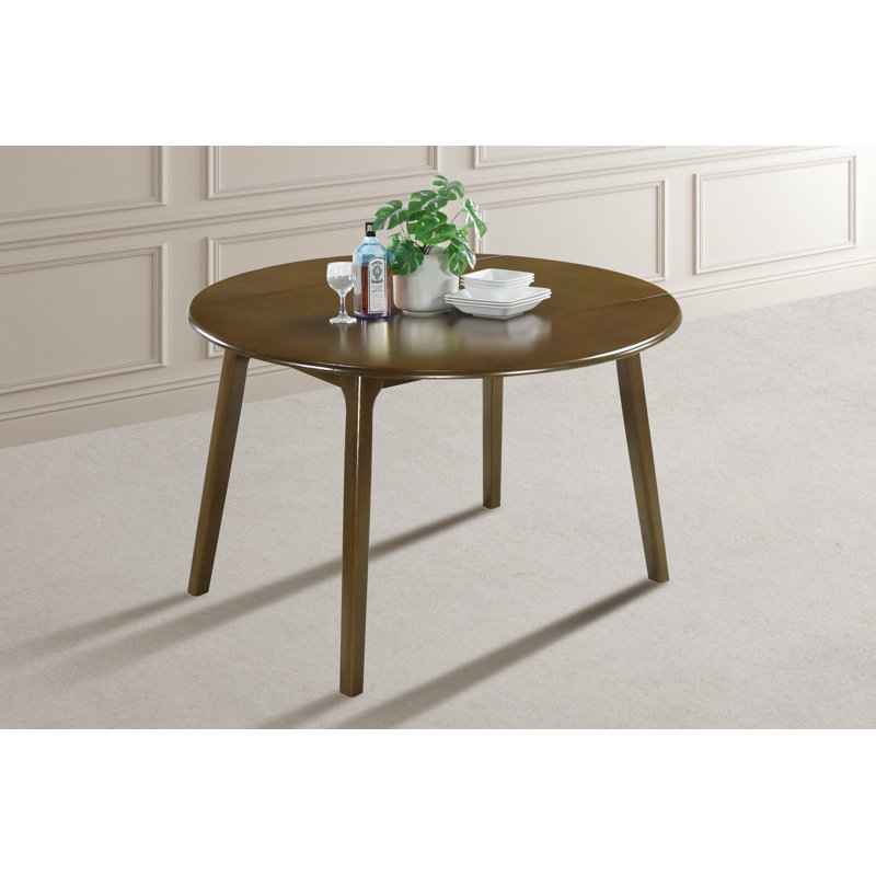 Baljeet Round Solid Wood Base Dining Table