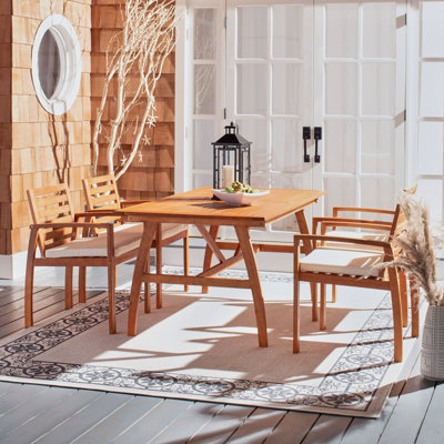 Upper Swainswick 4 - Person Wood Patio Dining Set with Rectangular Table , Cushions Included