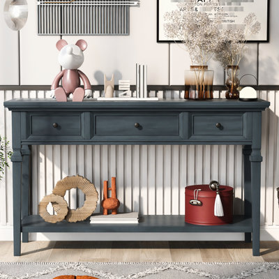 Console de style rétro en bleu marine avec rangement de tiroir et trois tiroirs pratiques
