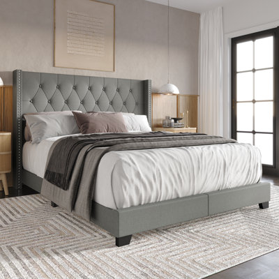 Elysian Upholstered Wingback Bed