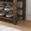 Un long banc à langer réglable en hauteur, fabriqué en bois d'hévéa naturel, est livré avec un siège confortable, un espace de rangement dissimulé et de grands compartiments de rangement, en bois grainé gris anthracite.-677041799