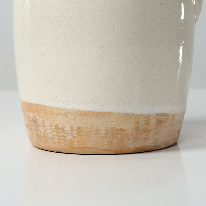 Approx. 9" High Off Whtie Ceramic Pitcher