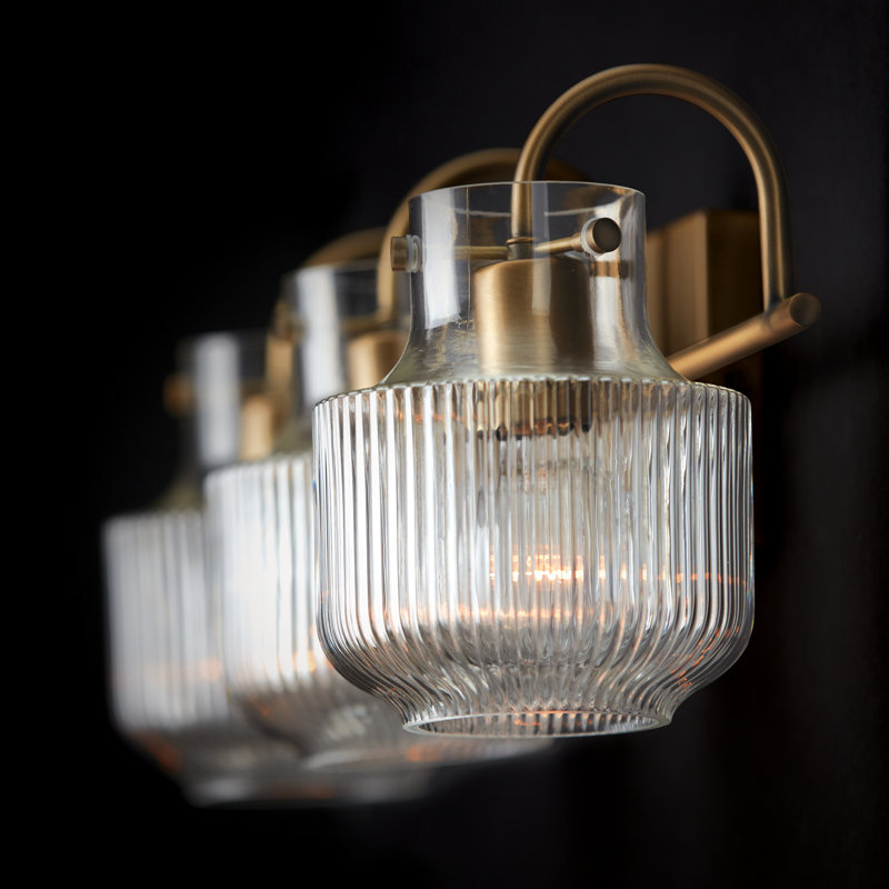 Aged Brass 3-Light Vanity with Clear Fluted Glass Shades