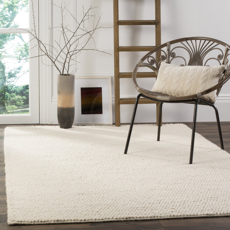 Natura Solid Color Area Rug In Ivory