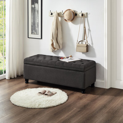 Banc de rangement confortable gris foncé avec boutons et sièges en tissu d'ameublement en lin