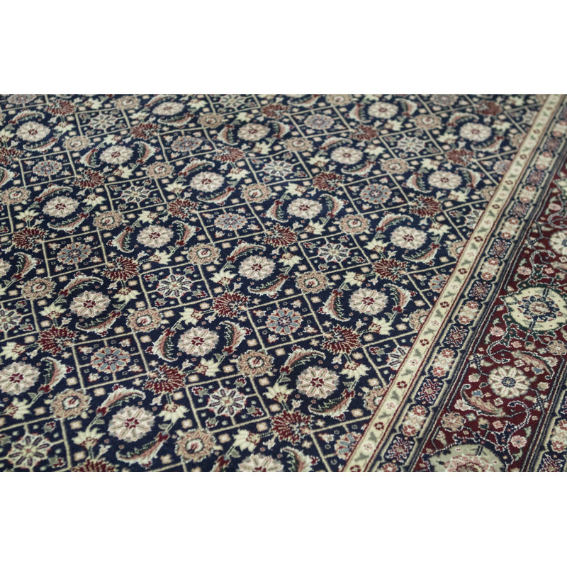 Tapis bleu marine et vin de haute qualité noué à la main
