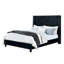 Structure de grand lit en velours noir, entièrement revêtue de tissu d'ameublement avec tête de lit à oreilles et motif à losanges-117185890