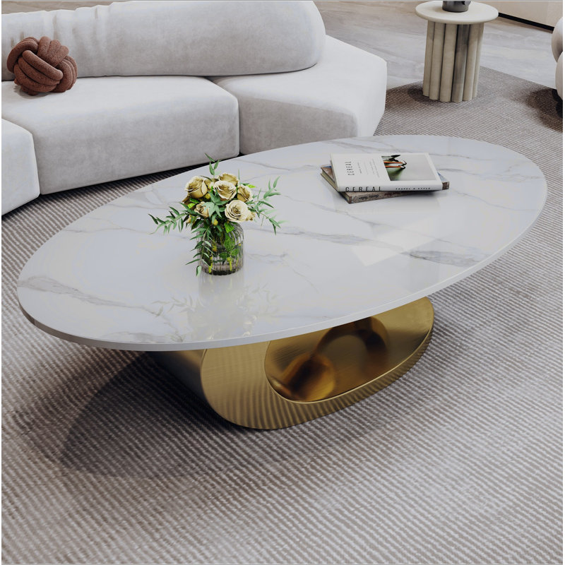 Table basse en marbre avec base sculpturale en acier inoxydable, Doré