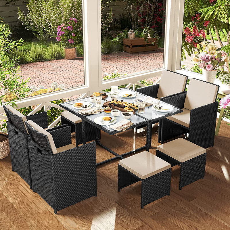 Ernesta 8 - Person Wicker Patio Dining Set with Square Table , Cushions Included, Black