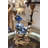 Porcelain Boy Figurine With Bronze Candle Holder Blue and White
