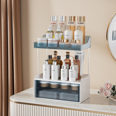 Organisateur de maquillage à 2 niveaux et 2 tiroirs pour le comptoir de salle de bain - Plateaux robustes en PET et structure en métal, facile à assembler, rangement polyvalent pour les soins de la peau, les parfums, les cosmétiques et plus encore