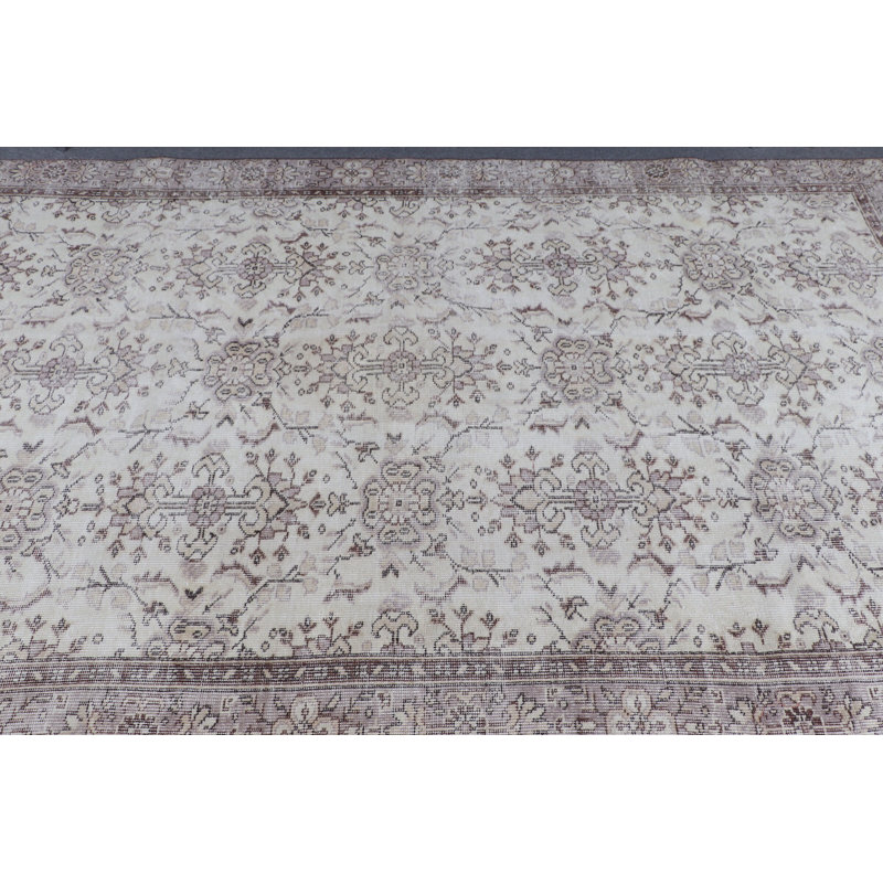 Classic Turkish Area Rug in Elegant Cream and Brown Creating An Atmosphere of Timeless Home Elegance with Unique Handmade Design and Oriental Pattern