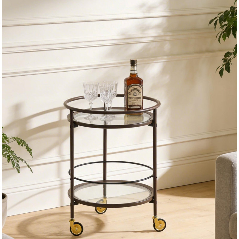 Chariot-bar rond brun moderne avec tablettes en verre trempé et roulettes verrouillables dorées