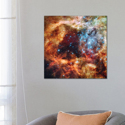 A Stellar Nursery Known As R136 In The 30 Doradus Nebula by Stocktrek Images - Wrapped Canvas Print