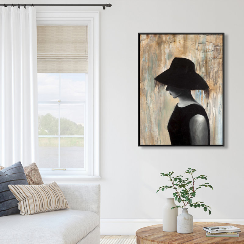 Audrey Hepburn avec un grand chapeau imprimé sur toile