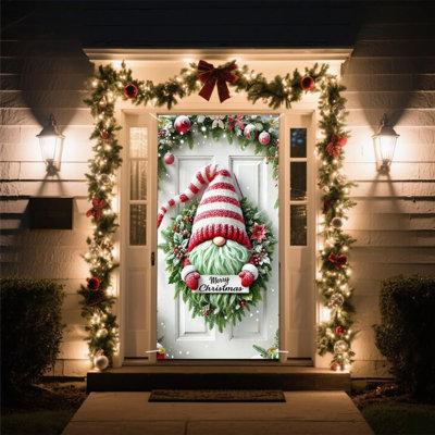 Bannière de porte de Noël avec des arcs et des pommes de pin