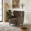 Fauteuil club rembourré à oreilles