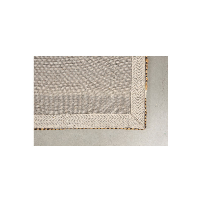 Djahe Striped Area Rug in Brown/White