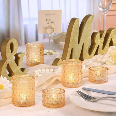 Ensemble de 20 photophores dorés en verre, offerts en 2 tailles. Décoration idéale pour les centres de table de mariage, les enterrements de vie de jeune fille, les fêtes prénatales, les anniversaires et les décorations de table.