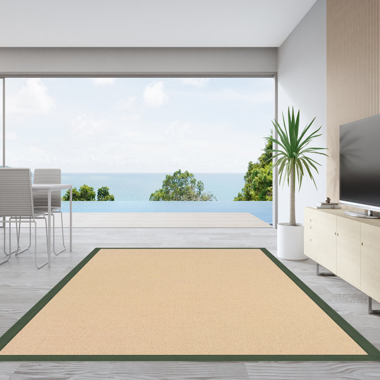 Nannette Handmade Light Beige Berber with Green Cotton Border Area Rug