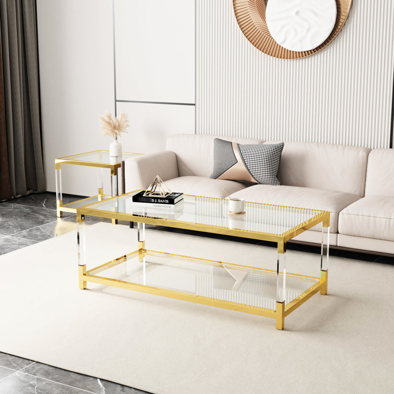 Table basse moderne et élégante avec matériaux transparents en métal et en acrylique, fabrication transparente