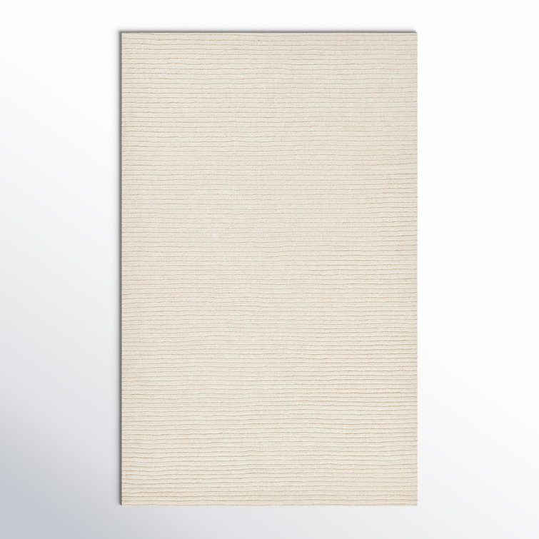 Guiness Solid Color Hand Loomed Wool Area Rug in Beige