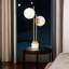 Suruthi Modern 23" Brass & Glass Table Lamp with Dual Globe Shades, Gold Finish
