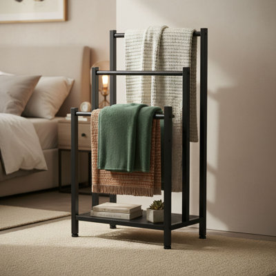 Space-Saving Freestanding Towel Rack For Bathroom; Black Industrial Style; Three-Tier Metal Design; Multi-Functional Storage Rack With Shelves For Drying, Displaying, And Organizing Towels.