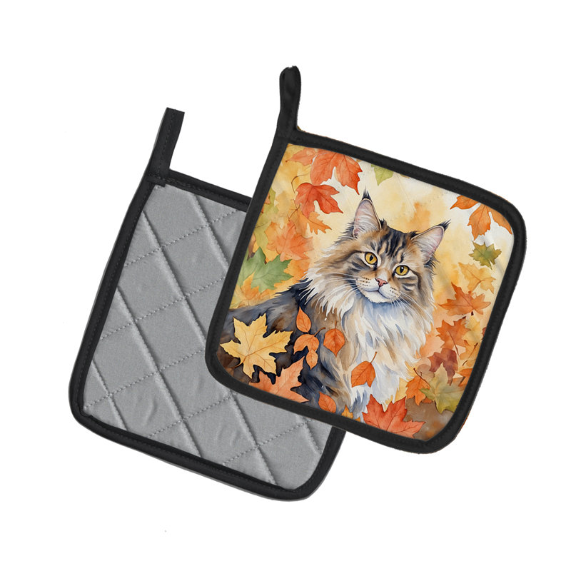 Chat norvégien en forme de paire de porte-casseroles à feuilles d'automne