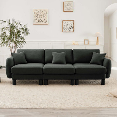 Canapé 3 places Boucle avec accoudoirs distinctifs en forme de coquillage, pieds cylindriques recouverts de tissu
