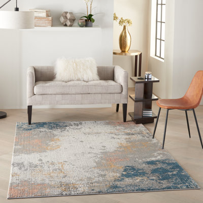 Tapis abstrait gris / bleu / ivoire
